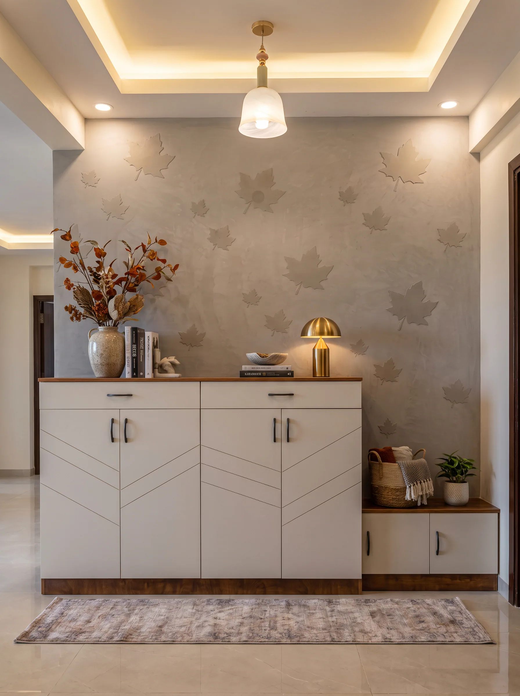 Islamabad apartment entry with tailored console and softly lit feature wall